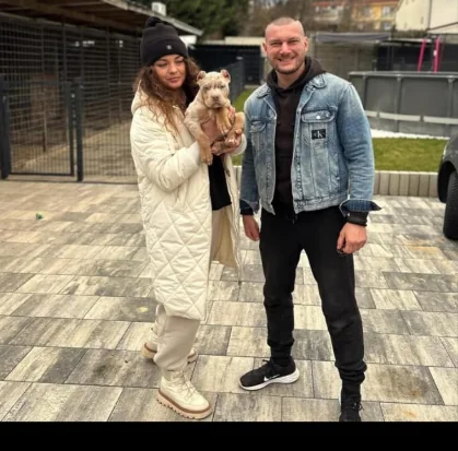 Happy customer with their new puppy from Pocket XL Bullies